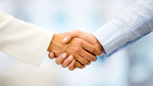 Two people shaking hands